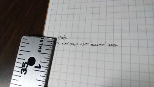 handwriting next to a ruler
